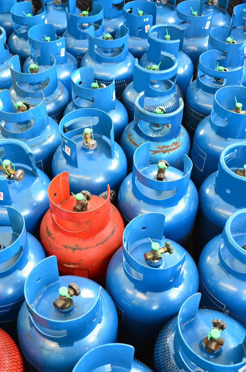 Blue and red gas canisters.