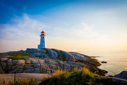 Peggy’s Cove lighthouse and the coastline at dusk