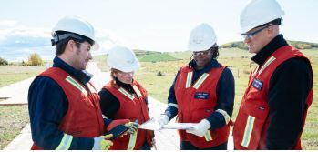 CER Inspection Officers reviewing documents in a field