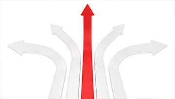 A red arrow going straight is flanked by two arrows on each side that are turning outward.